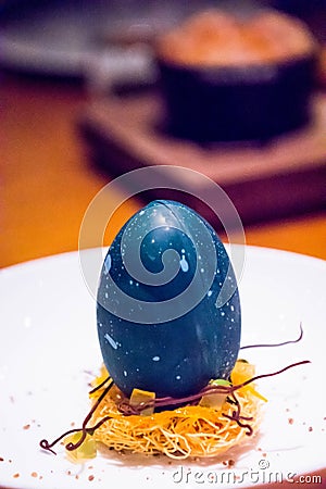 Open egg shaped dessert Stock Photo