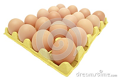 Eggs in yellow eggtray Stock Photo