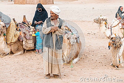 Egypt / Hurghada - 01/05/2016: Bedouin families and camels in the desert Editorial Stock Photo