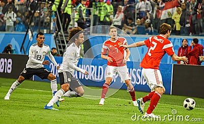 Egypt national team players Amr Warda and Mohamed Abdel-Shafy against Russia national team players Mario Fernandes and Daler Editorial Stock Photo