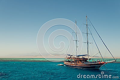 Sailing tour boat above clear sea Editorial Stock Photo