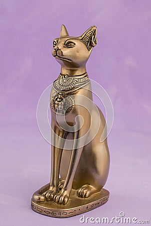 Egyptian cat Bast or Bastet, solar and war goddess, isolated on pink background Stock Photo