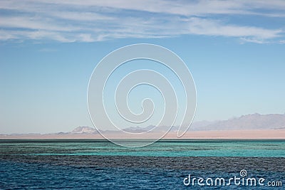 Egyptian landscape. Blue sky and tricolor sea. Stock Photo
