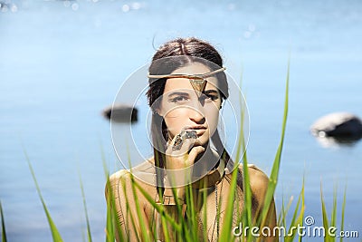 Egyptian queen goddess. Shooting outdoors in the style of ancient Egypt. Stock Photo
