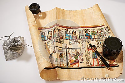 Egyptian scroll, pen and a bag of money Stock Photo