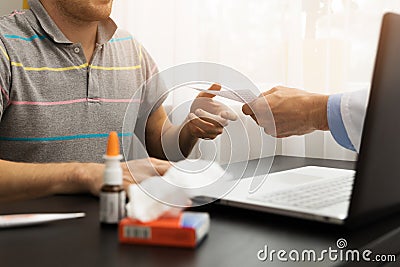 Ehealth - doctor giving a medical prescription to patient Stock Photo