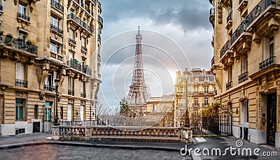 The eifel tower in Paris from a tiny street Stock Photo