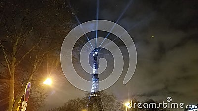 Eiffel Tower Light Beams Stock Photo