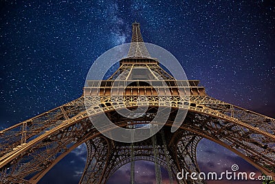 The Eiffel Tower at night in Paris, France Editorial Stock Photo