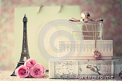 Eiffel tower with roses and perfume bottle Stock Photo