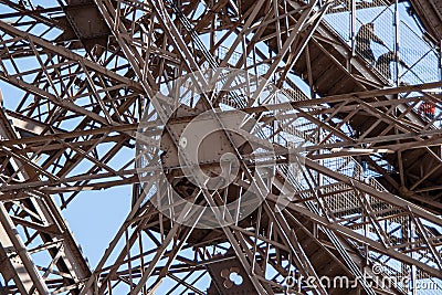 Eiffel Tower architecture detail, Simetric metal structure from below. Stock Photo