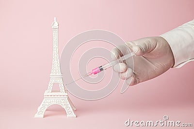 Eiffel Tower vaccination abstract. France fighting against covid-19 virus Stock Photo