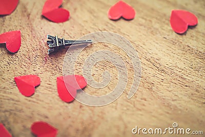 Eiffel Tower Miniature with Red Hearts Wallpaper Stock Photo