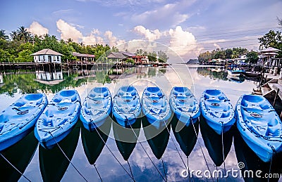 Eight blue kayak Stock Photo