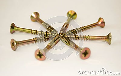 Eight cadmium screws Stock Photo