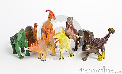 Eight different models of dinosaurs on white Stock Photo