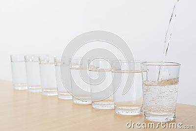 Eight glasses of water a day - ocho vasos de agua Stock Photo