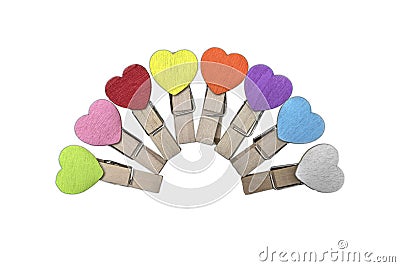 Eight wooden clips with colorful hearts Stock Photo