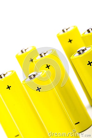 Eight yellow alkaline batteries Stock Photo