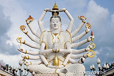eighteen-arms-buddha-over-blue-sky-14879479.jpg
