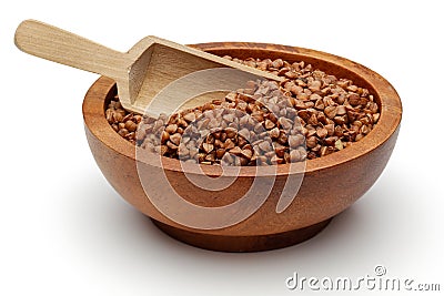 Einkorn wheat in wooden bowl isolated on white Stock Photo