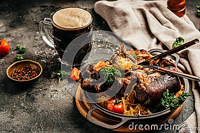 Eisbein with sauerkraut salad and beer. Oktoberfest menu, German cuisine Stock Photo