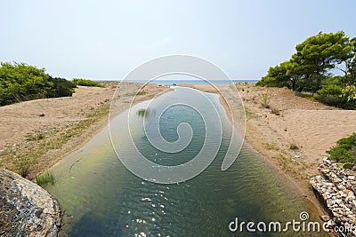 Ejection of Kaiafas lake into the sea, Greece. Stock Photo