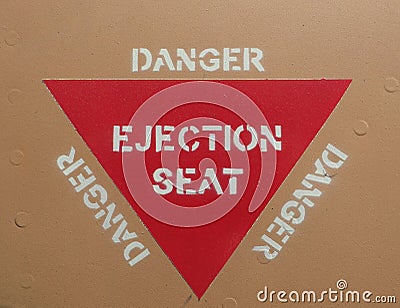 Ejection seat warning red triangle sign Stock Photo