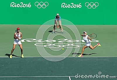 Ekaterina Makarova (L) and Elena Vesnina of Russia in action during women's doubles final of the Rio 2016 Editorial Stock Photo