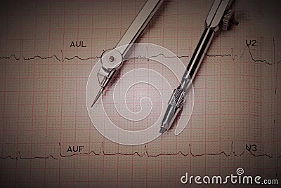 EKG printout and compasses Stock Photo