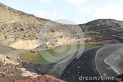 El Golfo green lagoon, Lanzarote, Spain Stock Photo