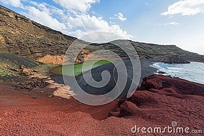 El Golfo green lake and volcanic coastline, Lanzarote, Spain Stock Photo