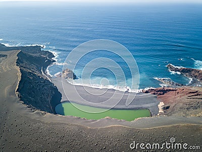 El Golfo green volcanic lake and ocean from above, Lanzarote, Canaries Stock Photo