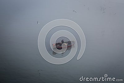 El Jadida, Morocco - March 08, 2017: Fishing boat under the wall Editorial Stock Photo