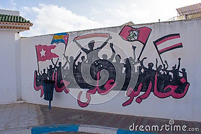 6.11.23 El Jem, Tunisia: Street art Political Graffiti on walls in City of El Jem Tunisia. Editorial Stock Photo