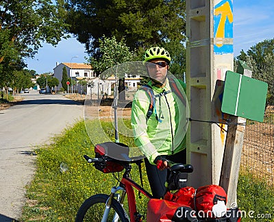 El Toboso don Quijote track sign and biker Stock Photo