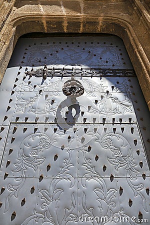 Beautiful elaborated doorknocker of San Bartolome church in Javea Stock Photo