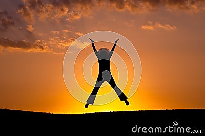 Elation jump. Silhouette Stock Photo