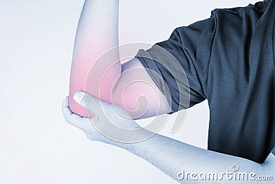 Elbow injury in humans .elbow pain,joint pains people medical, mono tone highlight at elbow Stock Photo