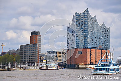 Elbphilharmonie concert hall in Hamburg with the boats marina on the front Editorial Stock Photo
