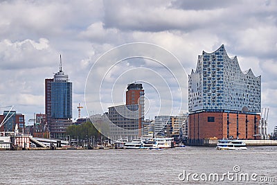 Elbphilharmonie concert hall in Hamburg with the boats marina on the front Editorial Stock Photo