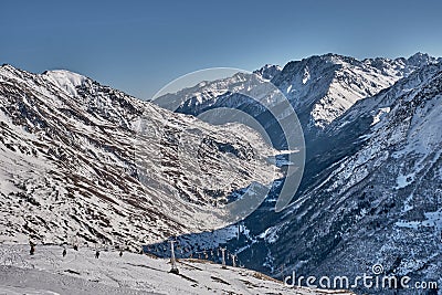 The Elbrus region. Baksan Gorge Kabardino-Balkaria Russia. Chair lift on Mount Cheget Editorial Stock Photo