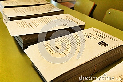 Ballots to vote on a table at a polling station Editorial Stock Photo