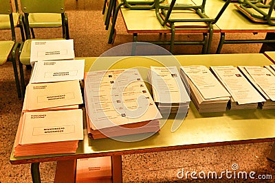 Ballots to vote on a table at a polling station Editorial Stock Photo