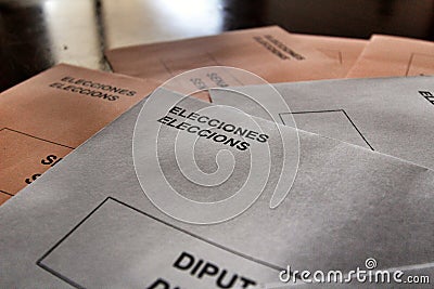 Ballots to vote on a table at a polling station Editorial Stock Photo