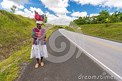 Elder local woman on road, Dominican Republic Editorial Stock Photo