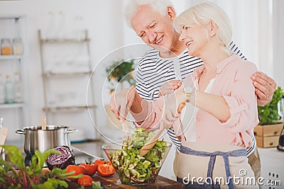 Wife is preparing veggie salad Stock Photo