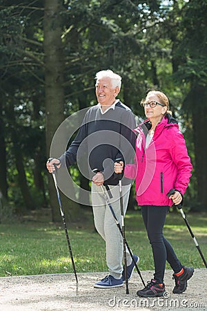 Elder pair strolling Stock Photo