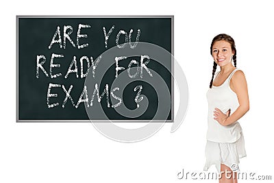 Elder schoolgirl in front of a blackboard Stock Photo