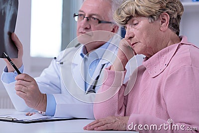 Elder woman's sadness Stock Photo